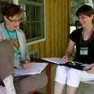 Kim Griswell works with one of our conferees.