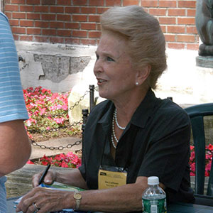 Bee at a book signing at a Highlights Foundation conference.