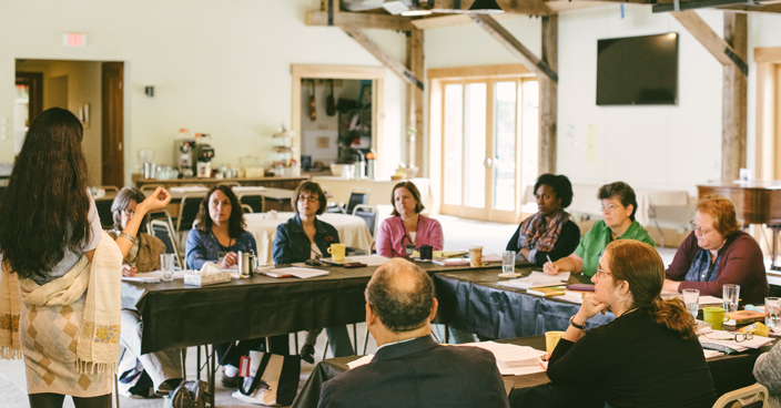 Workshoppers Gathered Around a Table