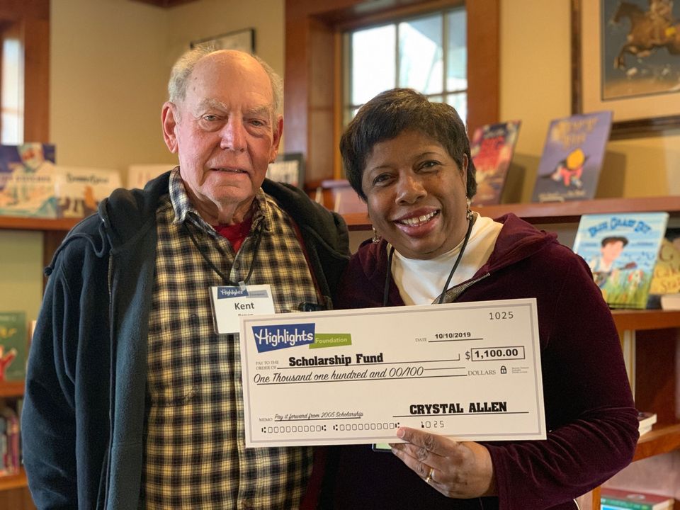 crystal-kent Crystal Allen hands Kent Brown a check for $1,100