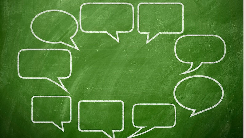 Speech Bubble shapes on a chalkboard background.