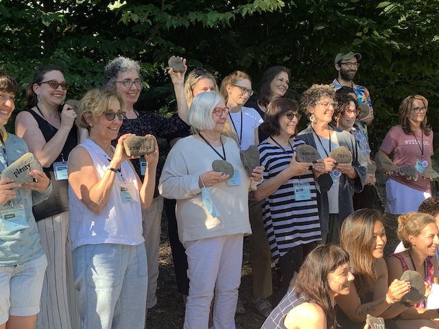 Jewish Writers and Illustrators and PJ Library Picture Book Summer Camp holding rocks form the Word Garden.