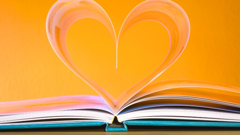 open book with heart made from pages