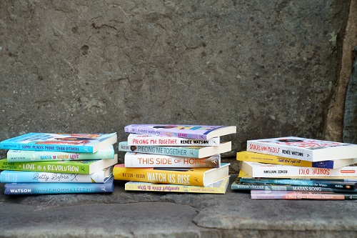 Copies of Renée Watson's books for the Cottage bookshelves.