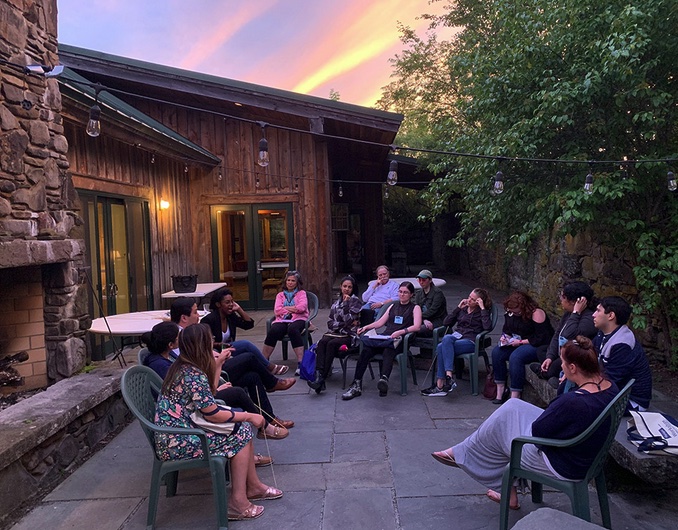 People hanging out on the barn patio