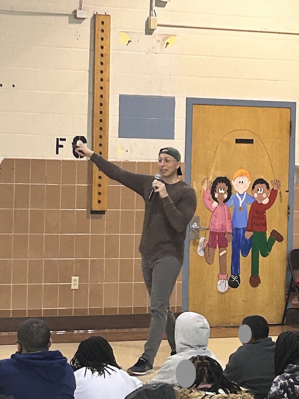 George Jreije visiting a school.