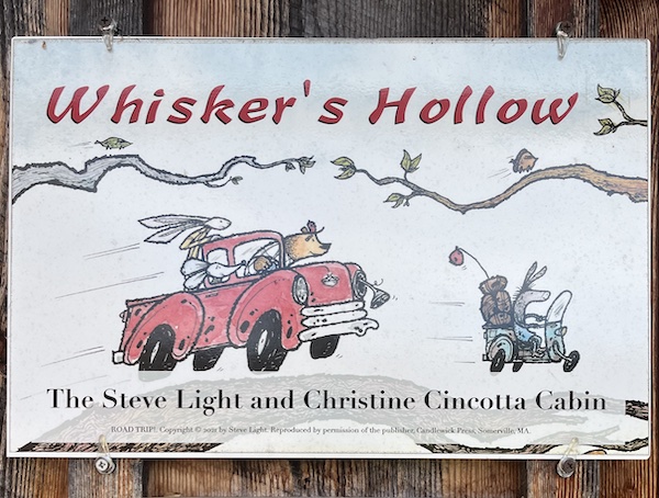 whiskers-hollow Sign with text: Phoenix Farm Annex/Jane Yolen Cabin