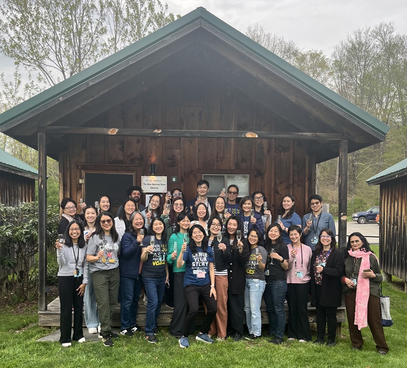 Celebrating the cabin at the 2024 In-Community Retreat