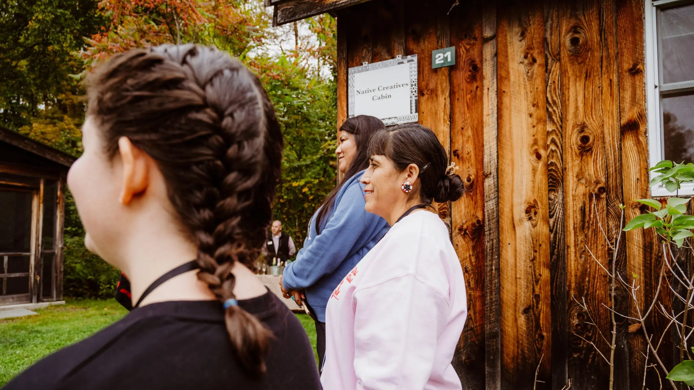 native creatives cabin at boyds mills with people in foreground