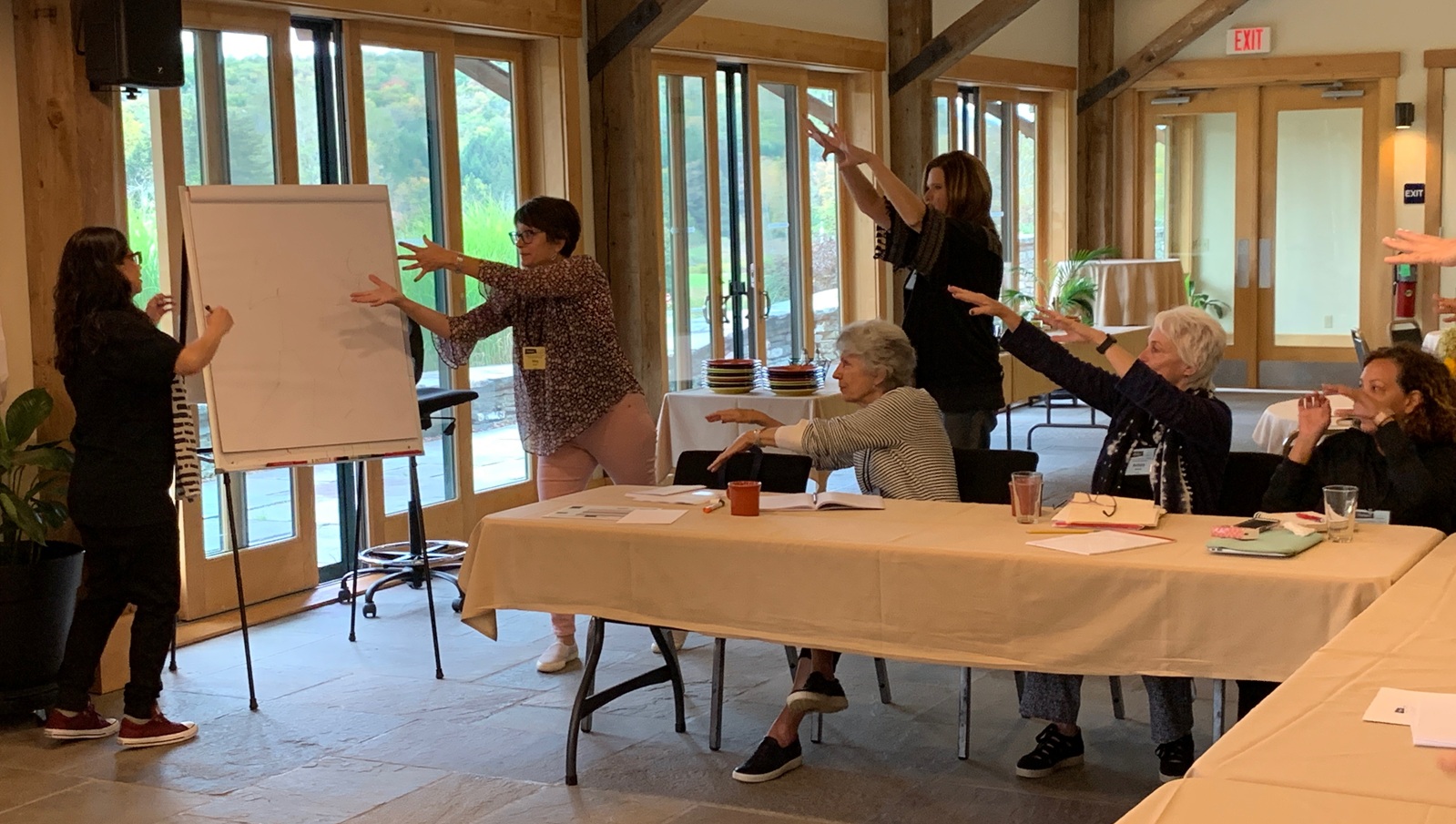 Photo of Meg Medina teaching storytellers