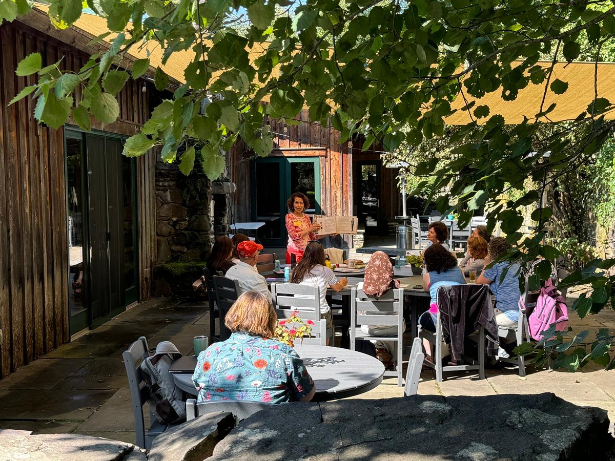 Photo of Summer Camp attendees on the patio
